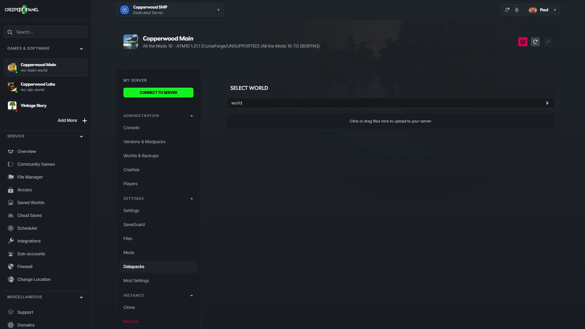 CreeperPanel Minecraft Datapacks page showing world selection and a datapack upload drop zone.