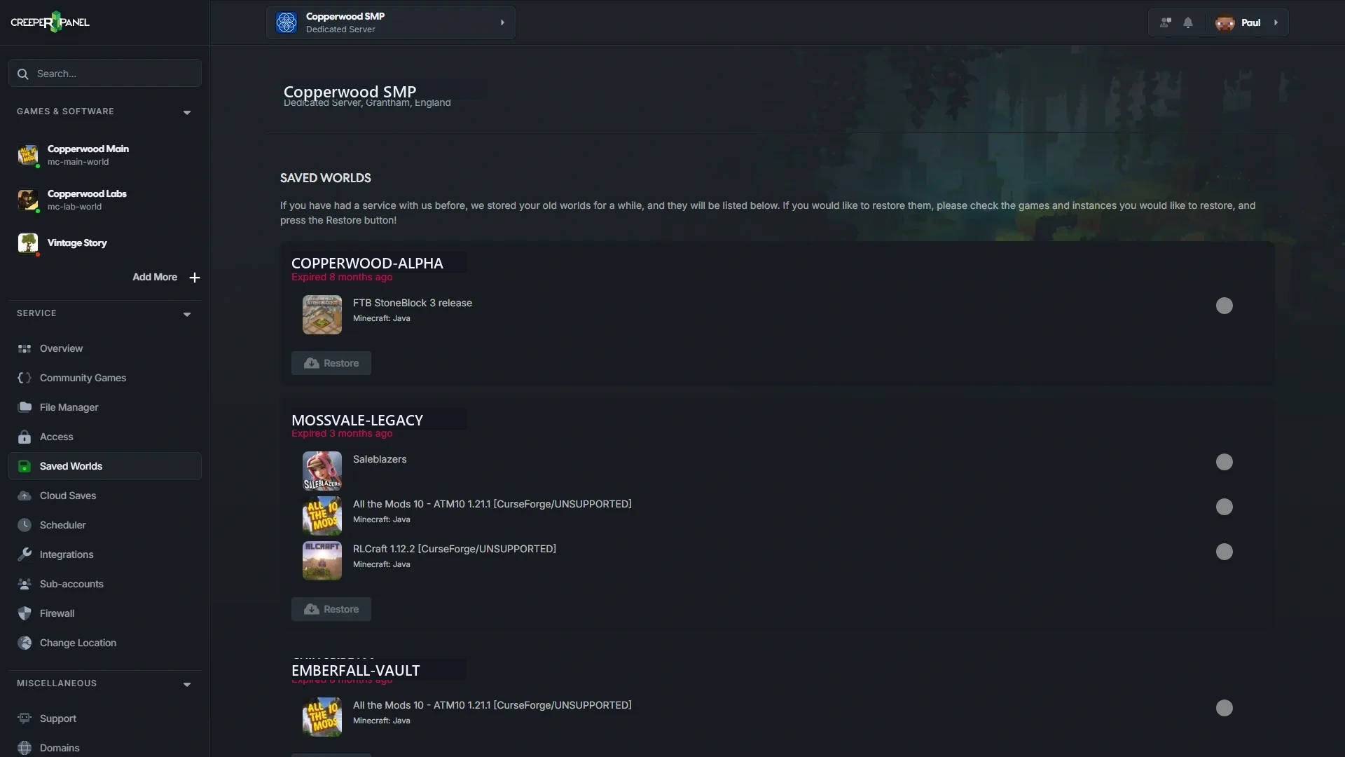 CreeperPanel Saved Worlds page showing stored Minecraft worlds with restore controls.